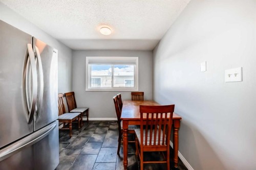3-4503 75 Street Nw, Calgary, AB - Indoor Photo Showing Dining Room