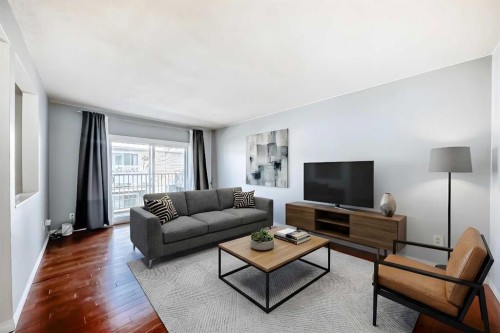3-4503 75 Street Nw, Calgary, AB - Indoor Photo Showing Living Room