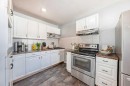 3-4503 75 Street Nw, Calgary, AB  - Indoor Photo Showing Kitchen With Stainless Steel Kitchen With Upgraded Kitchen 