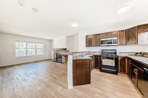 137 Eversyde Boulevard Sw, Calgary, AB - Indoor Photo Showing Kitchen With Double Sink