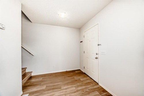 137 Eversyde Boulevard Sw, Calgary, AB - Indoor Photo Showing Other Room