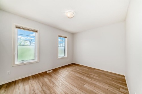137 Eversyde Boulevard Sw, Calgary, AB - Indoor Photo Showing Other Room