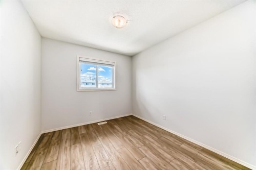 137 Eversyde Boulevard Sw, Calgary, AB - Indoor Photo Showing Other Room