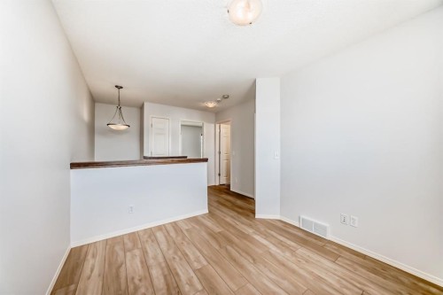 137 Eversyde Boulevard Sw, Calgary, AB - Indoor Photo Showing Other Room