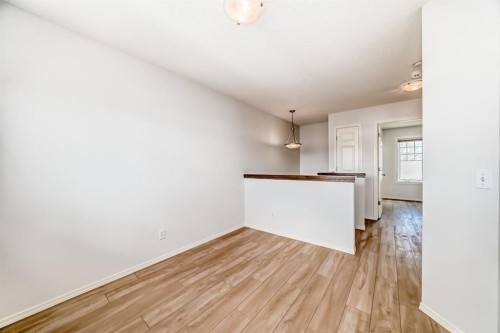 137 Eversyde Boulevard Sw, Calgary, AB - Indoor Photo Showing Other Room
