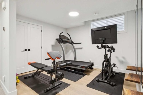 22 Mahogany Cove Se, Calgary, AB - Indoor Photo Showing Gym Room