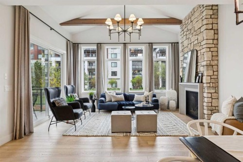 22 Mahogany Cove Se, Calgary, AB - Indoor Photo Showing Living Room With Fireplace