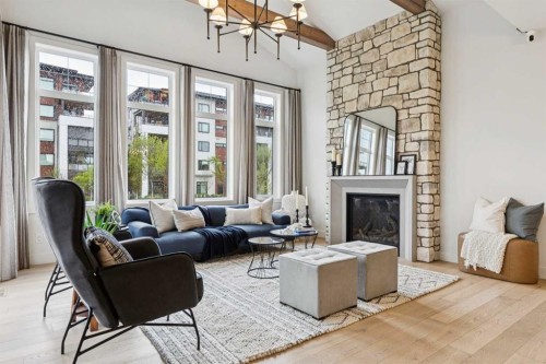 22 Mahogany Cove Se, Calgary, AB - Indoor Photo Showing Living Room With Fireplace