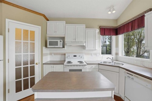 12 Citadel Park Nw, Calgary, AB - Indoor Photo Showing Kitchen With Double Sink