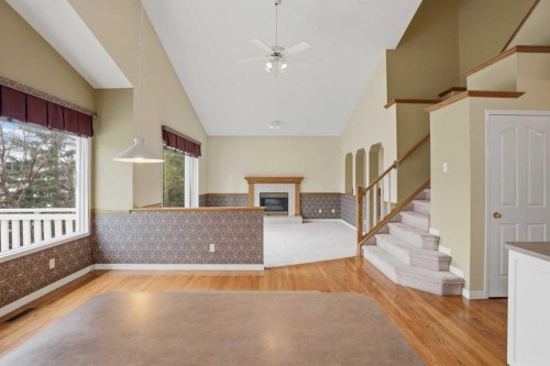12 Citadel Park Nw, Calgary, AB - Indoor Photo Showing Other Room With Fireplace