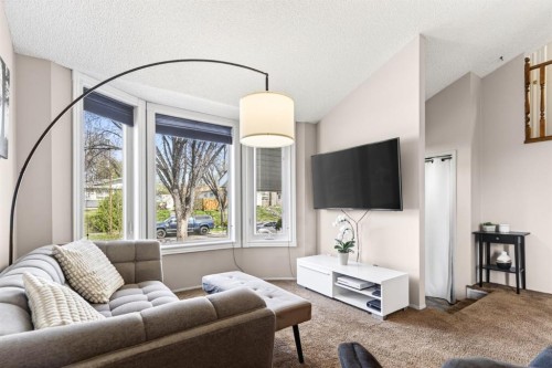 235 Deerview Drive Se, Calgary, AB - Indoor Photo Showing Living Room