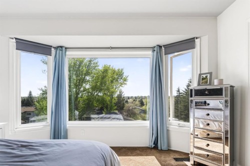 235 Deerview Drive Se, Calgary, AB - Indoor Photo Showing Bedroom