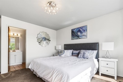 235 Deerview Drive Se, Calgary, AB - Indoor Photo Showing Bedroom