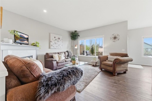 138 Bridlerange Place Sw, Calgary, AB - Indoor Photo Showing Living Room