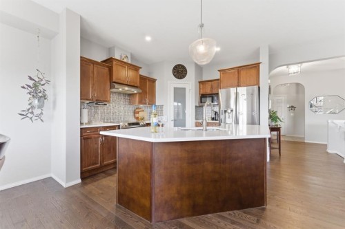 138 Bridlerange Place Sw, Calgary, AB - Indoor Photo Showing Kitchen With Upgraded Kitchen