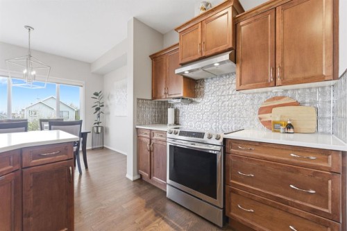 138 Bridlerange Place Sw, Calgary, AB - Indoor Photo Showing Kitchen