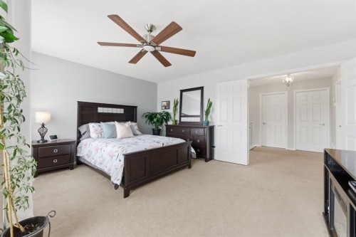 138 Bridlerange Place Sw, Calgary, AB - Indoor Photo Showing Bedroom