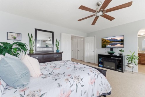 138 Bridlerange Place Sw, Calgary, AB - Indoor Photo Showing Bedroom