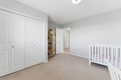 138 Bridlerange Place Sw, Calgary, AB - Indoor Photo Showing Bedroom