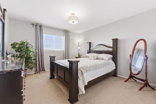 138 Bridlerange Place Sw, Calgary, AB - Indoor Photo Showing Bedroom