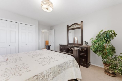 138 Bridlerange Place Sw, Calgary, AB - Indoor Photo Showing Bedroom