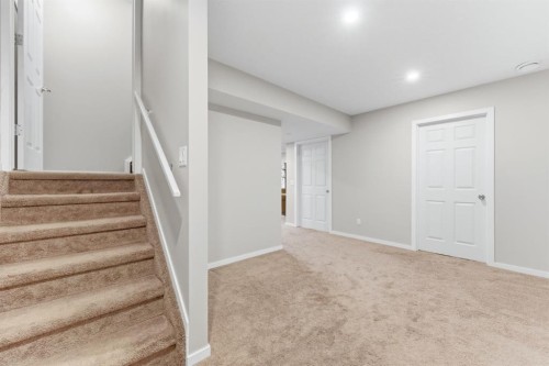 138 Bridlerange Place Sw, Calgary, AB - Indoor Photo Showing Other Room