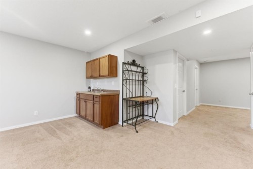 138 Bridlerange Place Sw, Calgary, AB - Indoor Photo Showing Other Room