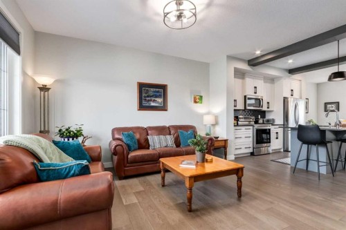 52 Mill Road, Cochrane, AB - Indoor Photo Showing Living Room