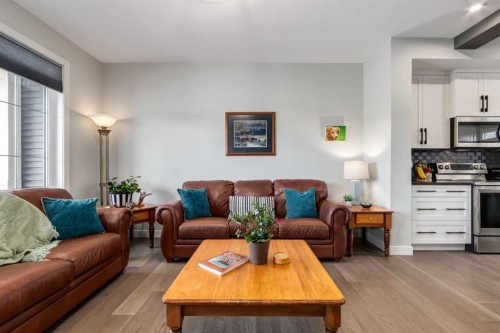 52 Mill Road, Cochrane, AB - Indoor Photo Showing Living Room