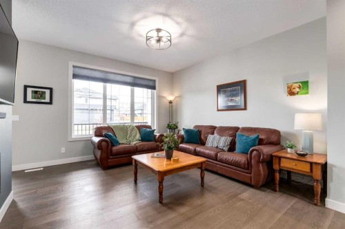 52 Mill Road, Cochrane, AB - Indoor Photo Showing Living Room