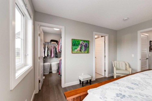 52 Mill Road, Cochrane, AB - Indoor Photo Showing Bedroom