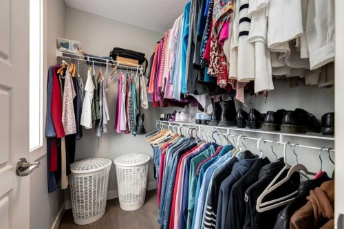 52 Mill Road, Cochrane, AB - Indoor With Storage