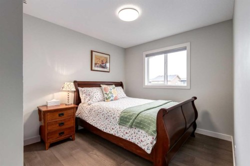 52 Mill Road, Cochrane, AB - Indoor Photo Showing Bedroom