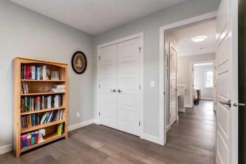 52 Mill Road, Cochrane, AB - Indoor Photo Showing Other Room