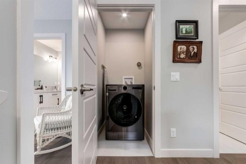 52 Mill Road, Cochrane, AB - Indoor Photo Showing Laundry Room