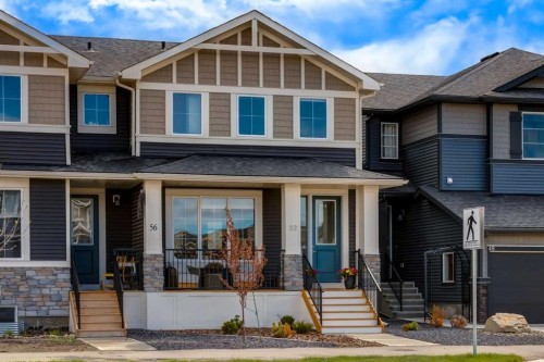 52 Mill Road, Cochrane, AB - Outdoor With Facade