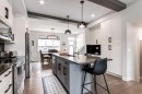 52 Mill Road, Cochrane, AB  - Indoor Photo Showing Kitchen With Double Sink With Upgraded Kitchen 