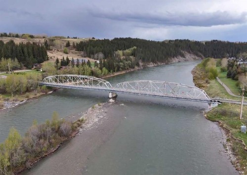 52 Mill Road, Cochrane, AB - Outdoor With Body Of Water With View