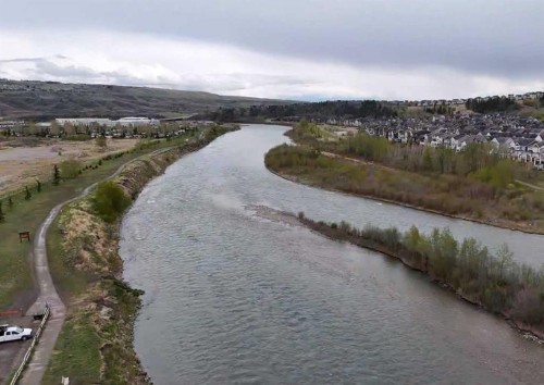 52 Mill Road, Cochrane, AB - Outdoor With Body Of Water With View
