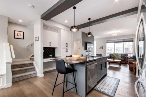 52 Mill Road, Cochrane, AB - Indoor Photo Showing Kitchen With Upgraded Kitchen