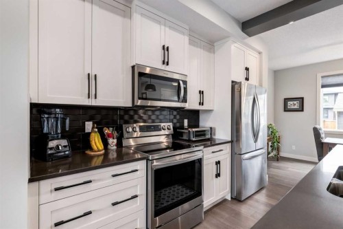 52 Mill Road, Cochrane, AB - Indoor Photo Showing Kitchen
