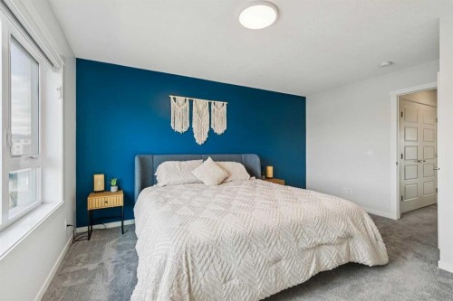 201 Vantage Drive, Cochrane, AB - Indoor Photo Showing Bedroom