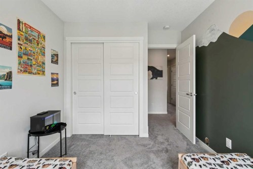 201 Vantage Drive, Cochrane, AB - Indoor Photo Showing Bedroom