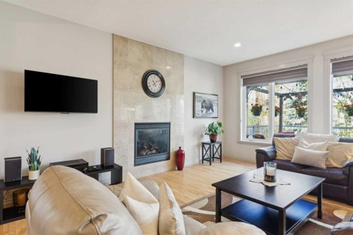 24 Auburn Sound Crescent Se, Calgary, AB - Indoor Photo Showing Living Room With Fireplace