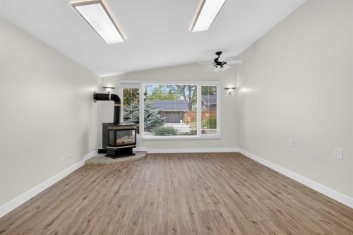 332 Wascana Crescent Se, Calgary, AB - Indoor With Fireplace