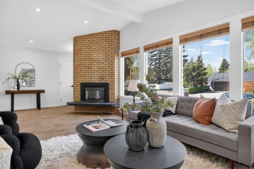 332 Wascana Crescent Se, Calgary, AB - Indoor Photo Showing Living Room With Fireplace