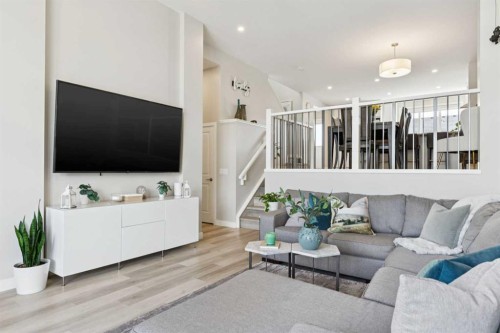 303 Masters Row Se, Calgary, AB - Indoor Photo Showing Living Room