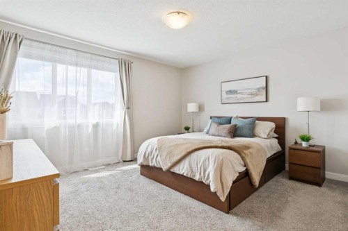 303 Masters Row Se, Calgary, AB - Indoor Photo Showing Bedroom