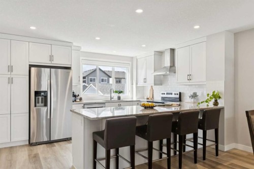 303 Masters Row Se, Calgary, AB - Indoor Photo Showing Kitchen With Upgraded Kitchen
