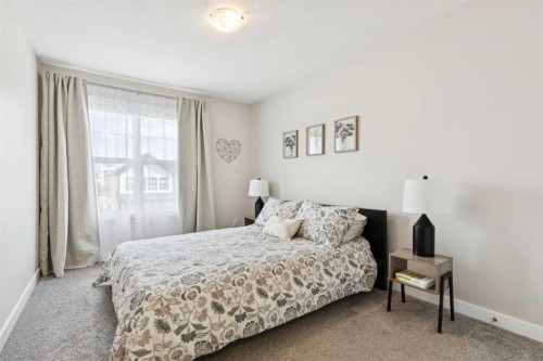 303 Masters Row Se, Calgary, AB - Indoor Photo Showing Bedroom
